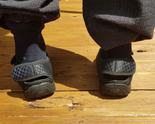 Eleanor's Essence adjustable adaptive slippers worn showing
back view and secure strap fit, suitable for swollen ankles NZ