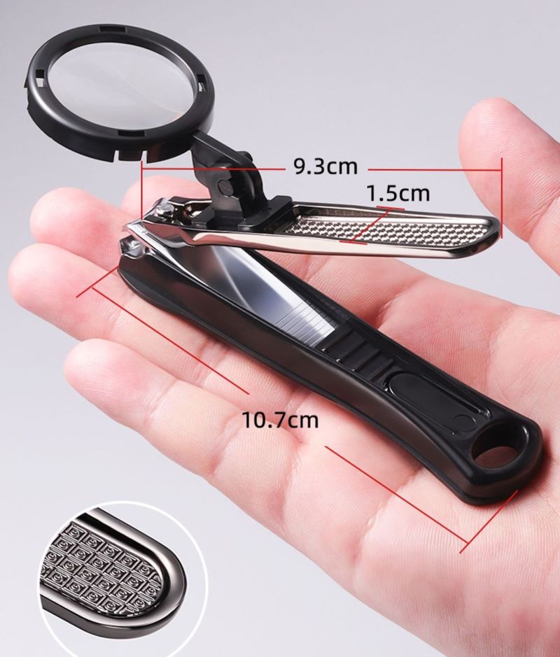 Regular black nail clipper with magnifier showing 10.7 cm clipper length, 9.3 cm handle and 1.5 cm width