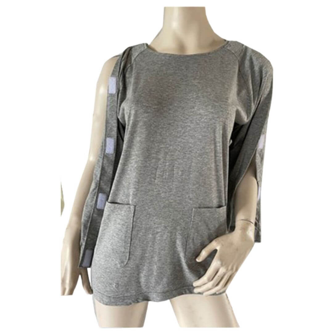 Unisex adaptive long sleeve back-opening top with full arm opening, displayed on a mannequin, easy-access dressing for post-surgery and wheelchair NZ