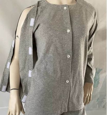 Adaptive long sleeve top worn on mannequin showing front closure and side Velcro arm opening, dual fastening system for easy independent or carer-assisted dressing NZ
