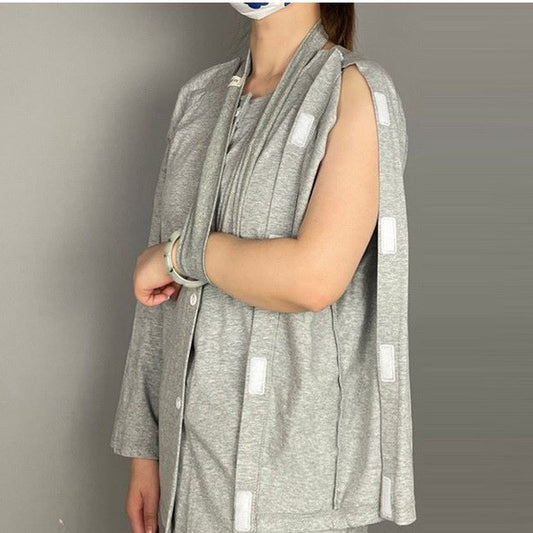 Adaptive side-opening long sleeve top worn by woman, Velcro fastening allows dressing without overhead lifting NZ