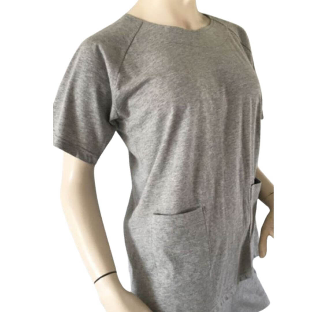 Adaptive short sleeve back-opening top worn on mannequin showing front view, looks like regular clothing with no visible adaptive features, discreet design for everyday wear NZ