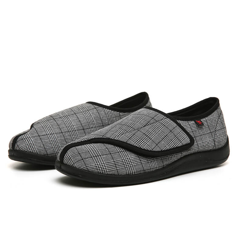 Arthur's Accolade unisex adaptive slippers laid flat showing grid 
pattern upper and wide touch-fastening closure for swollen feet NZ