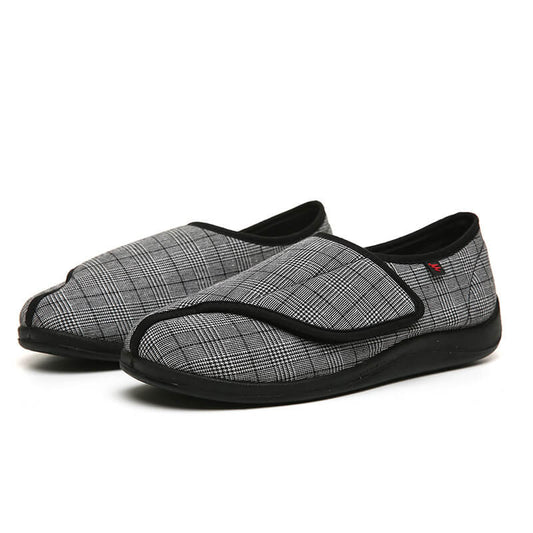 Arthur's Accolade unisex adaptive slippers laid flat showing grid 
pattern upper and wide touch-fastening closure for swollen feet NZ