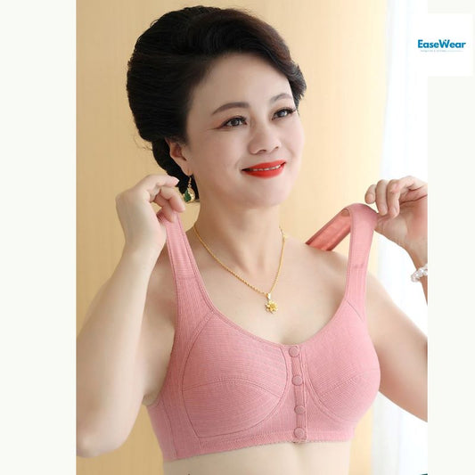 Senior woman wearing pink front opening adaptive bra with button closure NZ