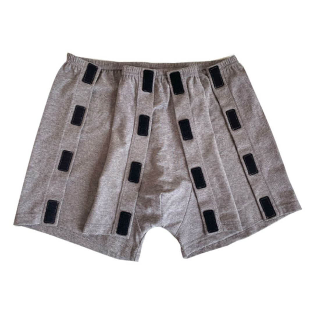 Men's adaptive boxer shorts with one side fully open showing Velcro fastening, demonstrates easy dressing access for limited mobility NZ