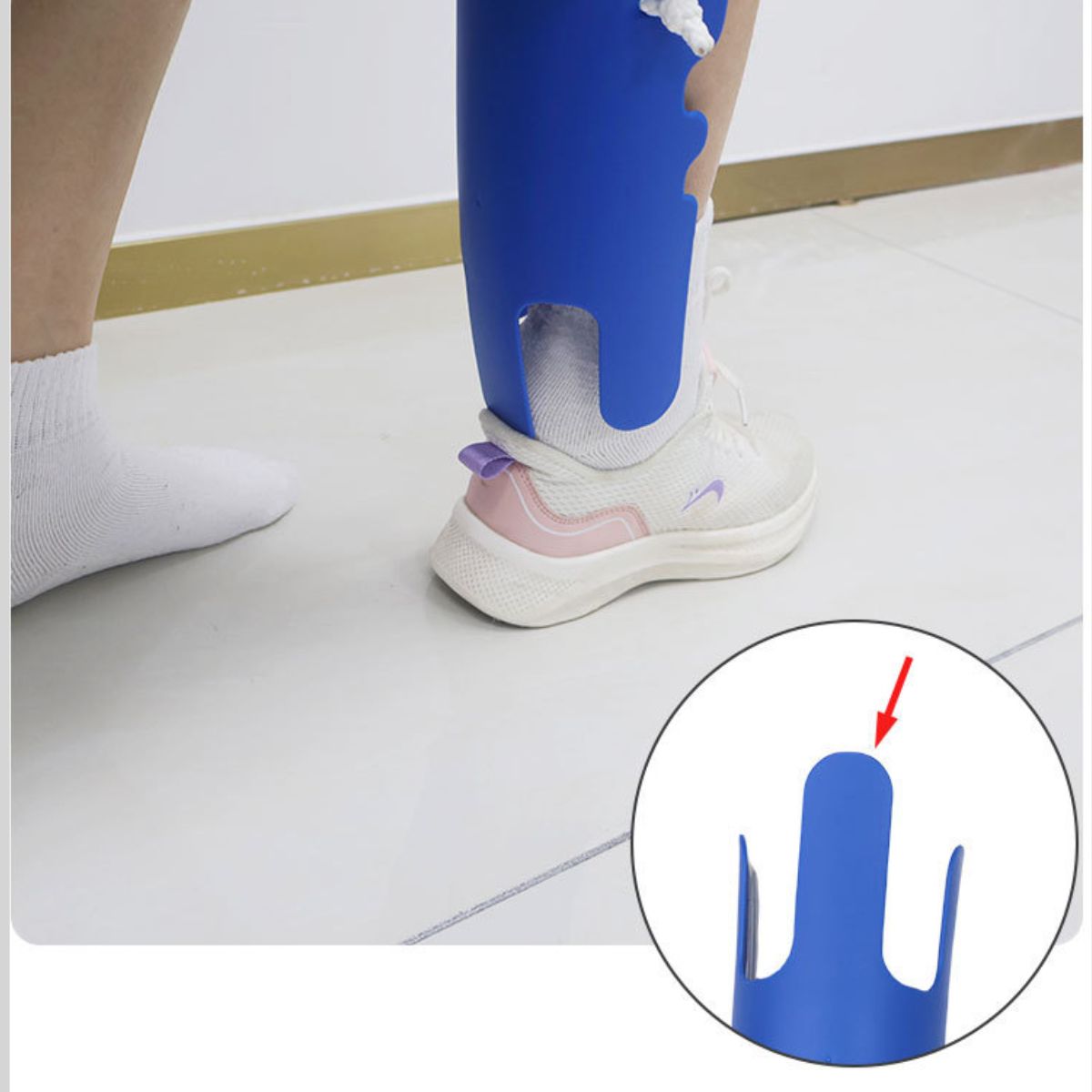 Built-in shoe horn notch on the sock aid being used to put on a shoe, NZ