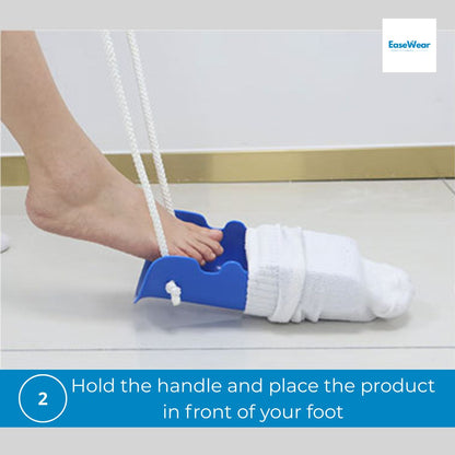 Step 2, positioning sock aid in front of foot, NZ