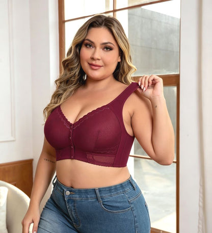 Woman wearing wine red fuller bust front opening adaptive bra with wide straps and wire-free support.