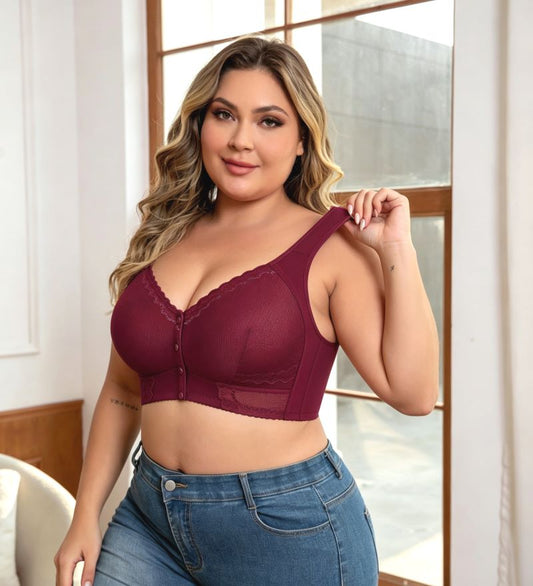 Woman wearing wine red fuller bust front opening adaptive bra with wide straps and wire-free support.
