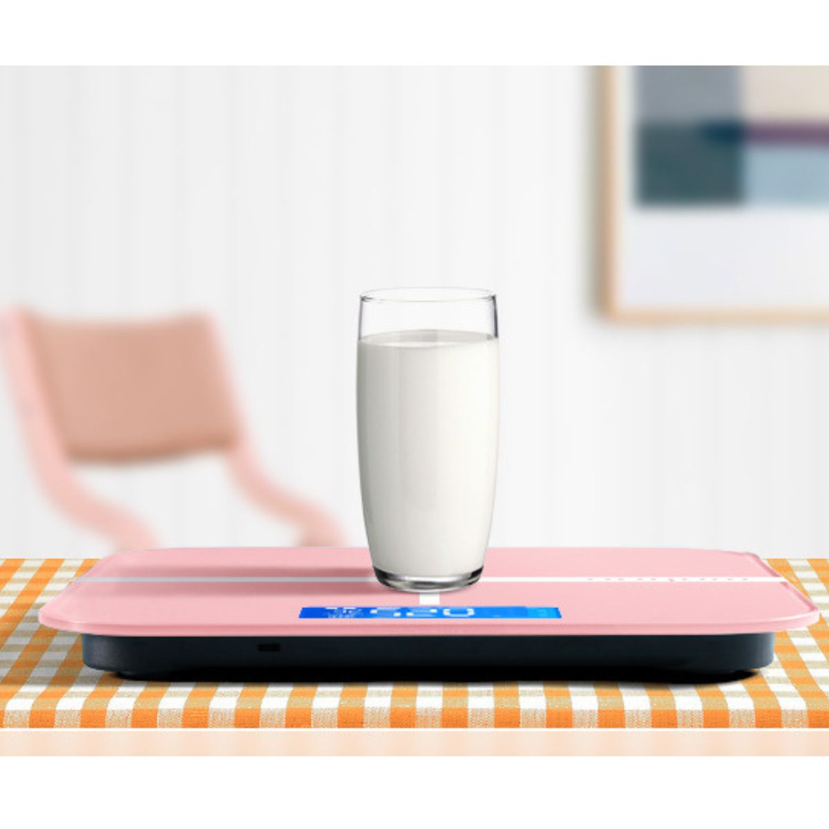 Rechargeable digital scale weighing a glass of milk, suitable for body weight and smaller household items