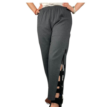Women's adaptive pants worn with the Velcro side opening partially open
